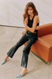 caption_Model wears Black Vegan Leather Trousers in UK 10 / US 6