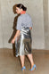 caption_Model wears Silver Vegan Leather Skirt in UK 18 / US 14