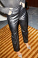 caption_Model wears Black Vegan Leather Trousers in UK 8 / US 4