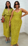 lucy and raf our wearing pieces from our lime sequin collection