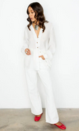 model is wearing the white miley shirt with  our ecru scallop detail jeans