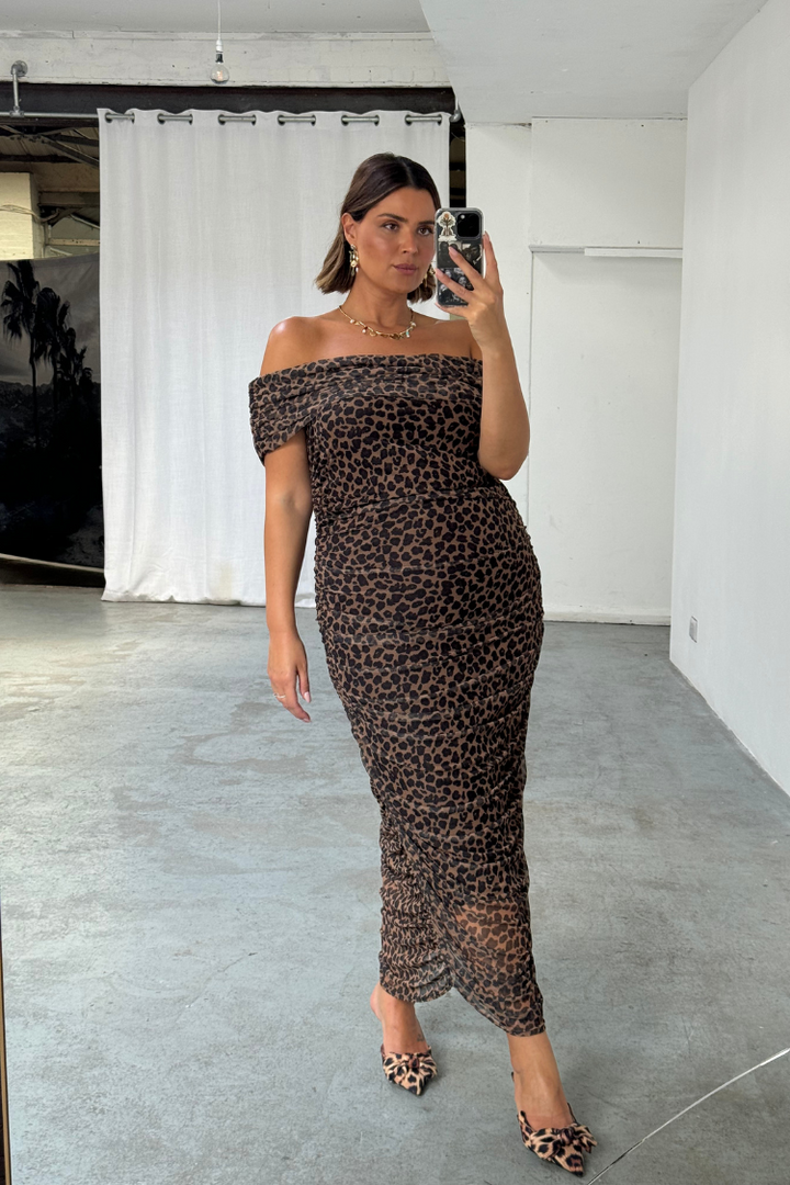 model is wearing our leopard diaz off the shoulder mesh dress