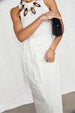 caption_Model wears White Linen Jaspre Skirt in UK size 10/ US 6