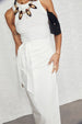 caption_Model wears White Linen Jaspre Skirt in UK size 10/ US 6