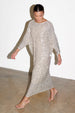 caption_Model wears Sequin Jem Dress in S/M