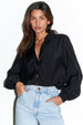 caption_Model wears Black Miley Shirt in UK size 8/ US 4