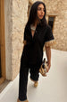 caption_Model wears  Black Raffia Shirt in UK size 8/ US 4