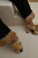 caption_Model wears  Black Raffia Marra Trousers in UK size 8/ US 4