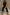 Thumbnail for caption_Model wears  Black Raffia Marra Trousers in UK size 8/ US 4