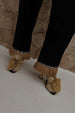  caption_Model wears  Black Raffia Marra Trousers in UK size 8/ US 4