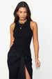 caption_Model wears Black Cotton Ribbed Tank  in size S