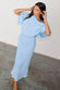 caption_Model wears Ice Blue Plisse Tilly Dress in size S