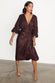 caption_Model wears Chocolate Sequin Vienna Dress in UK size 10/ US 6