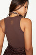 caption_Model wears Chocolate Cotton Ribbed Tank in UK size S