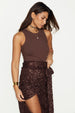 caption_Model wears Chocolate Cotton Ribbed Tank in UK size S