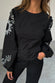 caption_Model wears Black Enchanted Lillie Top in UK size 8/ US 4
