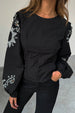 caption_Model wears Black Enchanted Lillie Top in UK size 8/ US 4