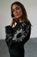 caption_Model wears Black Enchanted Lillie Top in UK size 8/ US 4