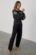 caption_Model wears Black Enchanted Lillie Top in UK size 8/ US 4