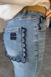 caption_Model wears Denim Flare Scallop Jean  in UK size 8/ US 4