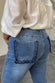 caption_Model wears Denim Flare Scallop Jean  in UK size 18/ US 14
