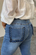 caption_Model wears Denim Flare Scallop Jean  in UK size 18/ US 14
