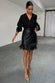 caption_Model wears Black Vegan Leather Mini Fringe Jaspre Skirt in UK size 10/ US 6