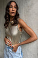 caption_Model wears Gold Ribbed Tank Top in UK size 10/ US 6
