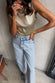 caption_Model wears Gold Ribbed Tank Top in UK size 10/ US 6