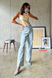 caption_Model wears Gold Ribbed Tank Top in UK size 10/ US 6