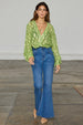 caption_Model wears Green Jacquard Miley Shirt  in UK size 10/ US 6