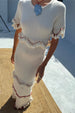 caption_Model wears Ivory and Red Harper Dress in size S