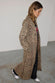 caption_Model wears Lucia Leopard Denim 55 Jacket  in UK size 8/ US 4