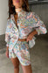 caption_Model wears White Magnolia Elissa Shorts in UK size 10/ US 6