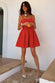 caption_Model wears Red Broderie Mini Lola Dress in UK size 10/ US 6