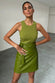 caption_Model wears Olive Cotton Ribbed Tank  in size S