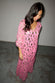 caption_Model wears Pink Jacquard Harmony Dress in UK size 8/ US 4