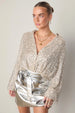 caption_Model wears Silver Sequin Miley Shirt in UK size 10/ US 6