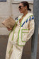 caption_Model wears  Stripe Quilted Jacket in size S