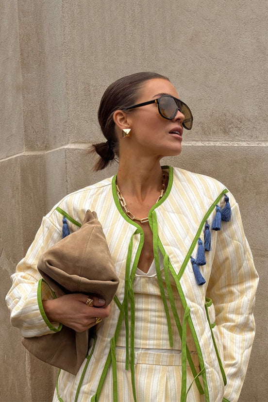 caption_Model wears  Stripe Quilted Jacket in size S