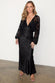 caption_Model wears Black Swallow Romance Emma Dress in UK size 10/ US 6