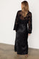 caption_Model wears Black Swallow Romance Emma Dress in UK size 10/ US 6