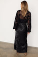 caption_Model wears Black Swallow Romance Emma Dress in UK size 10/ US 6