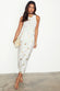 caption_Model wears  Gold Snake Jaspre Wrap Skirt in UK size 10 / US 6