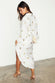 caption_Model wears  Gold Snake Jaspre Wrap Skirt in UK size 10 / US 6