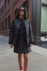 model wearing Black Quilted Skirt