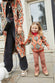 Model wearing NFD Kids Diamond Bomber standing facing the camera